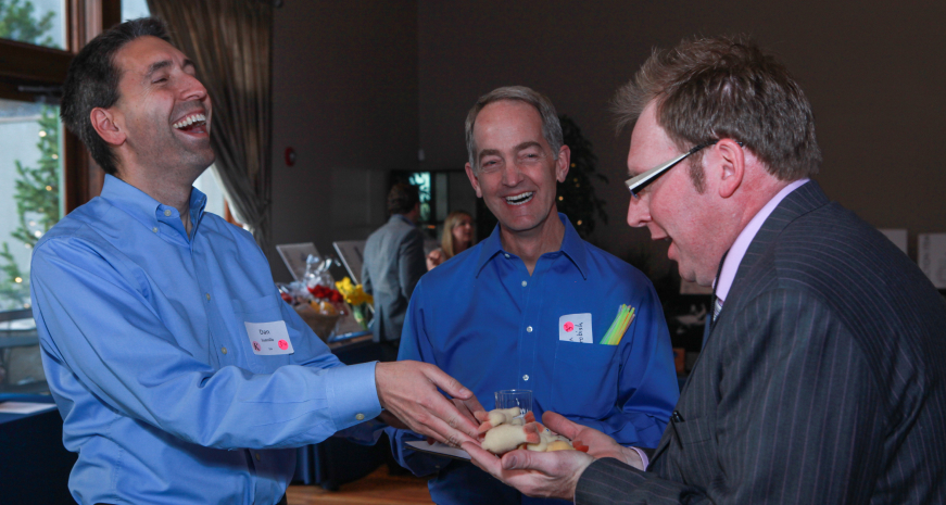 Denver magician Shawn Preston performing close up magic with some bunnies inside a persons hand